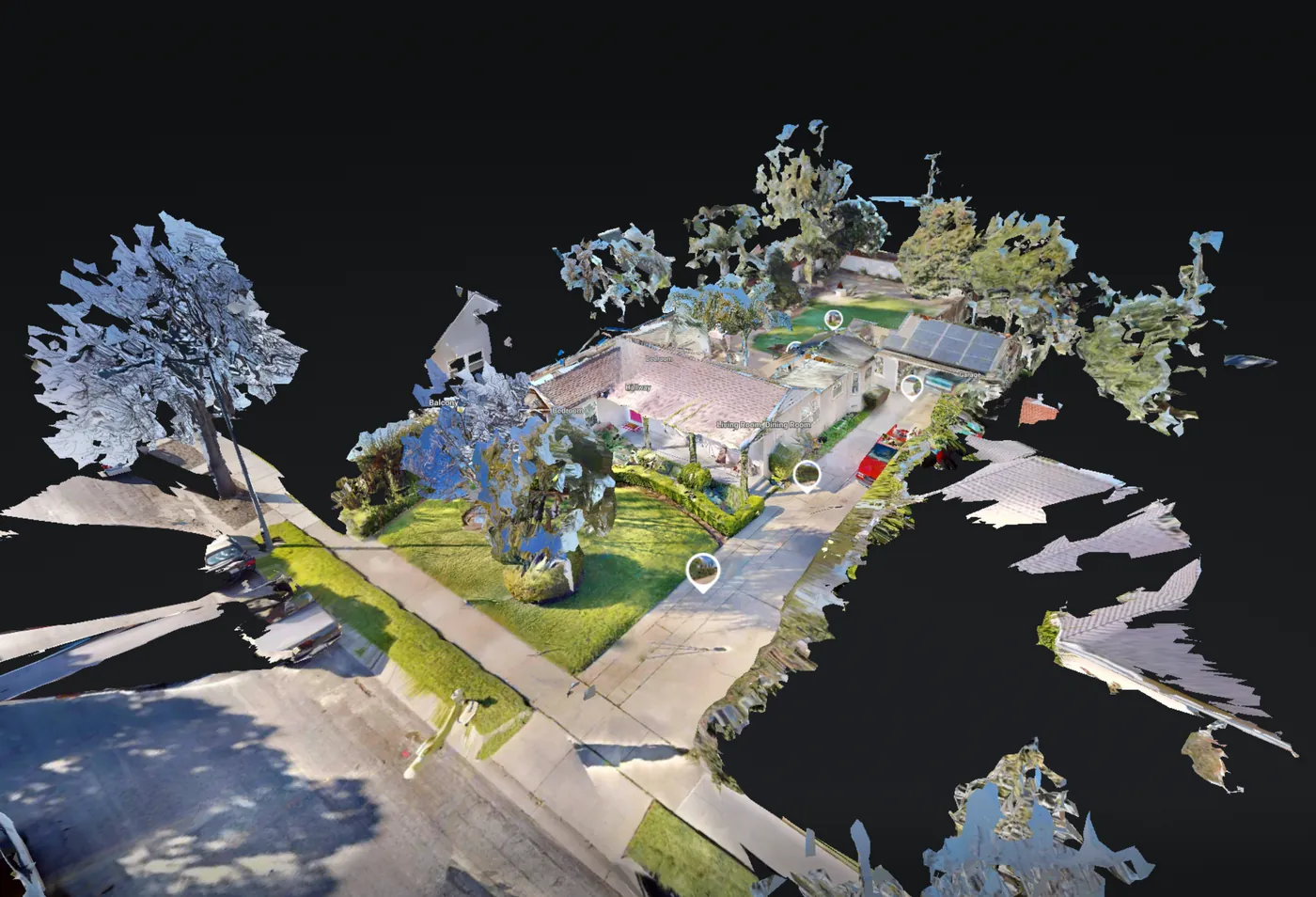 LiDAR scan of a house and its street shown as a textured 3D dollhouse model